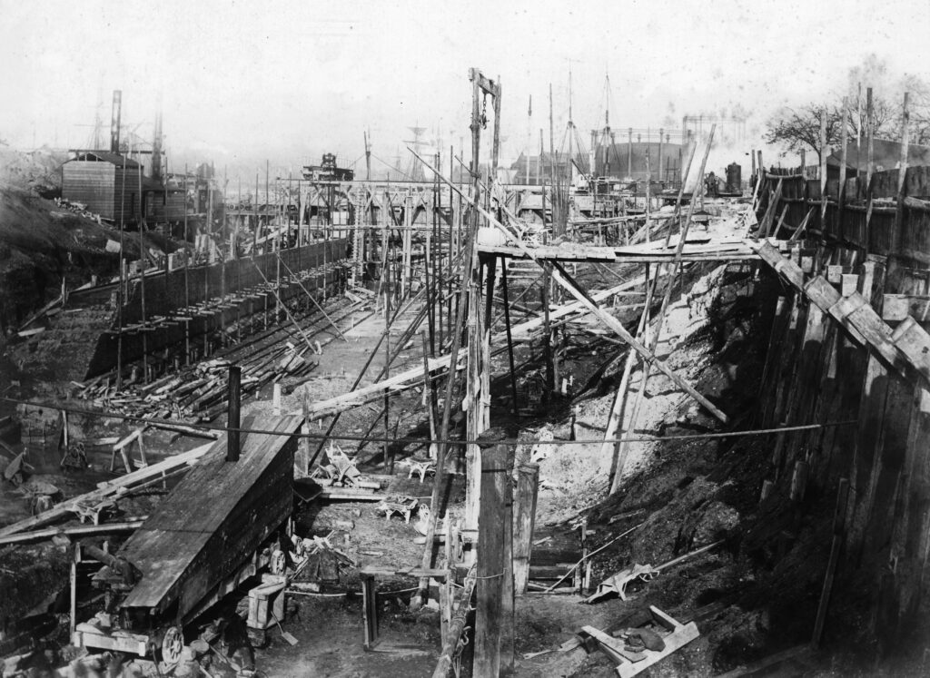 A black and white photo of a construction site