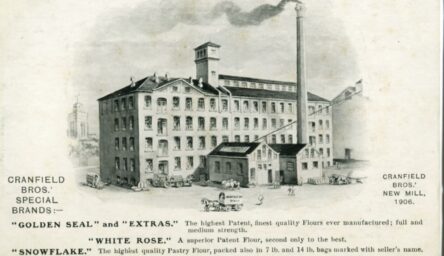 A black and white advertisement of a factory.