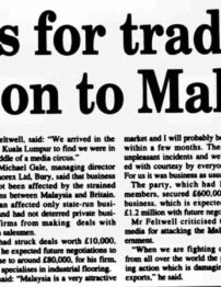 A newspaper page with black and white text.